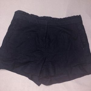 High wasted navy blue shorts with ruffles on top